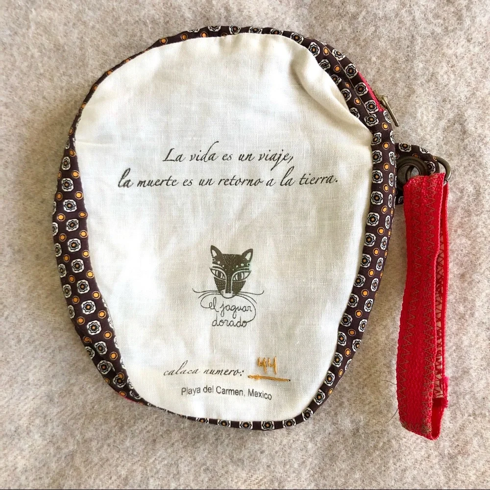 Handmade embroidered Santa Muerte skull wristlet
